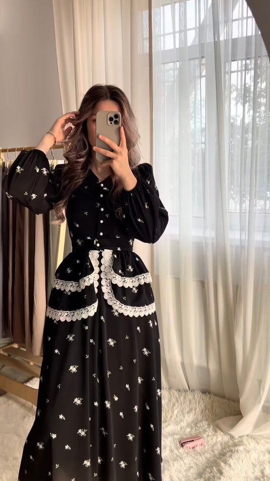 Black dress with crochet lace and floral print