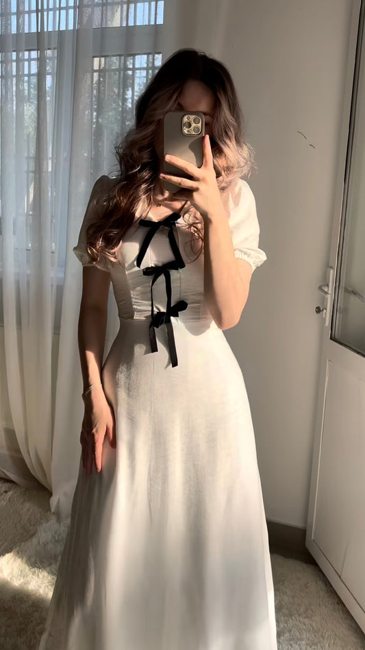 White dress with black bows